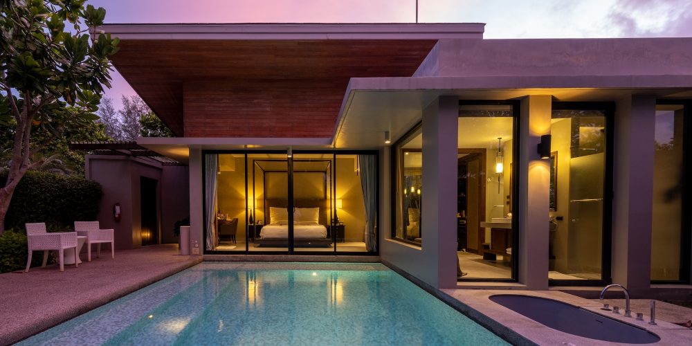 Modern house with a swimming pool, modern pool villa at the beach